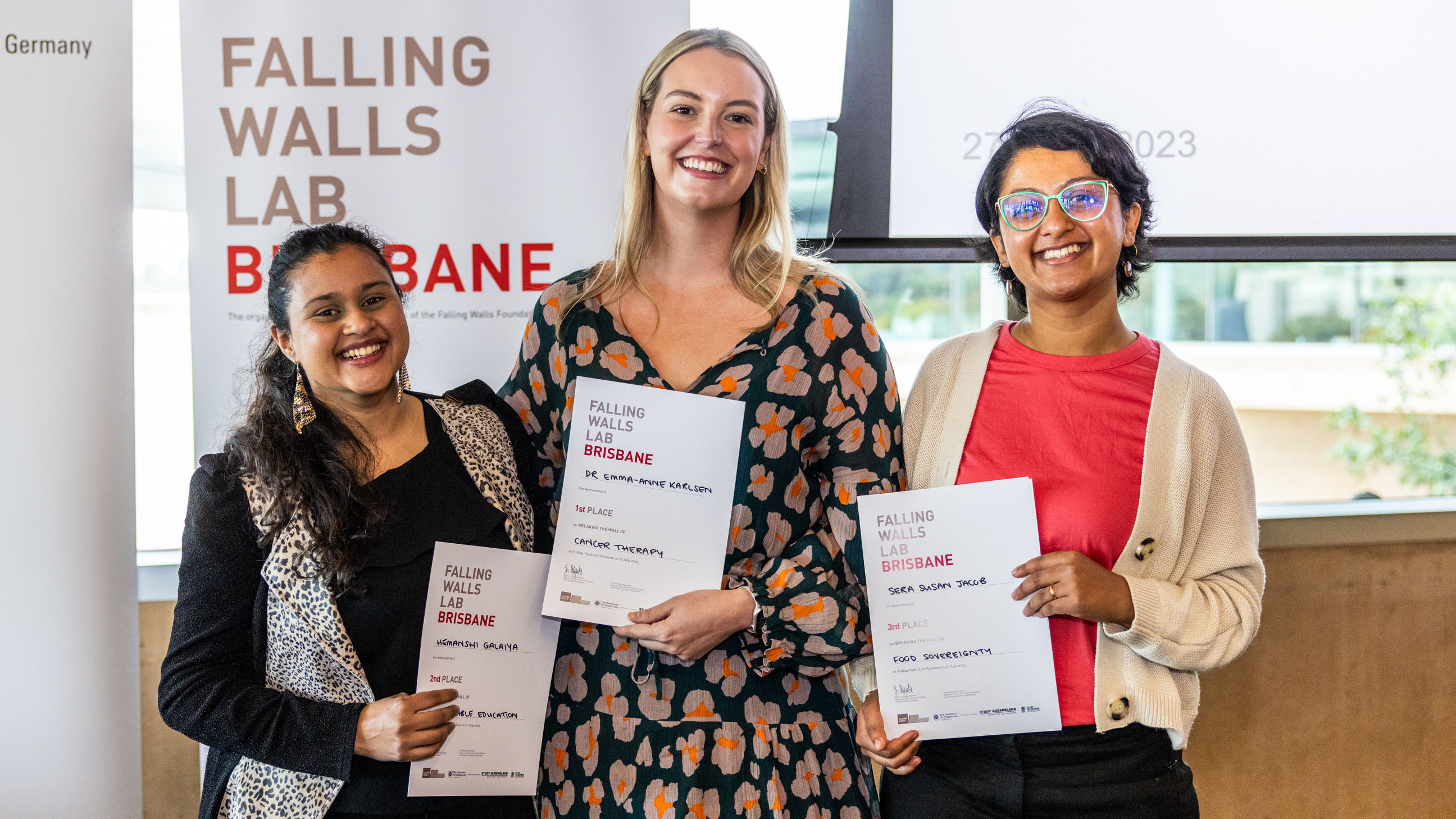 Falling Walls Lab Brisbane winners standing together and holding certificates